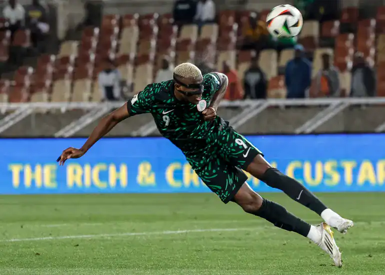 Nigeria’s Victor Osimhen heads the ball